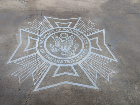 Logo etched into concrete